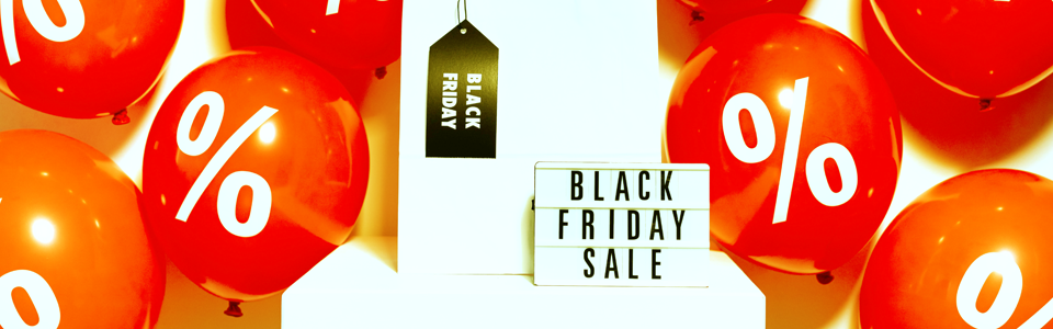 Black Friday - What to expect for your eCommerce Website in 2022 - discount balloons and shopping bag